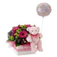This stunning floral gift is one of our favorites when it comes to newborns. Per...