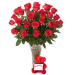 Red roses in a vase. For that special gift that is beautiful over the top and de...