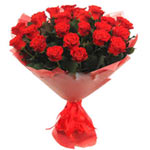 Let the fresh lovely 25 red roses with greens add charm to any occasion and fest...