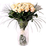 Beautifully cream roses 33 in a glass vase this really special gift to your belo...