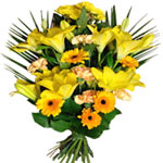 A beautiful and classic funeral bouquet in yellow lilies, germini, carnations an...