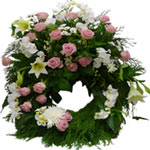  This wreath with its caring combination of red and white flowers  timeless.(Siz...
