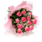 A beautiful bunch of pink roses wrapped beautifully with matching cellophane.<br...