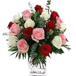 Red, Pink and White roses beautifully decorated in a glass vase, decorated beaut...