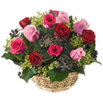 Beautiful mixed roses in a wicker basket. What a w...