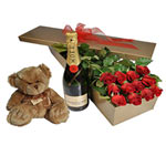 12 Long Stem Red Roses in a Box, Soft Toy Teddy, Moet & Chandon 750Ml. These bea...
