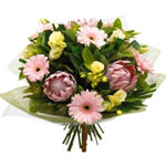 Cheer up a friend with this delightful flower bouq...