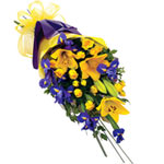 A gorgeous yellow and purple sheaf bouquet made up...