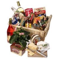 Exclusive basket includes white wine, olives, sun ...
