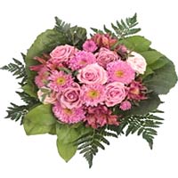 This charming arrangement of assorted  flowers in ...