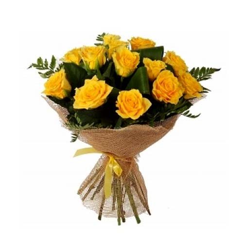 Send a treat to any flower lover by gifting this 12 Yellow Roses Bouquet...