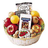 Send this yummy holiday basket of fresh fruit, nut...