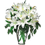 These gorgeous white lilies are so classically ele...