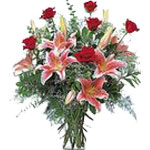 This elegant vased arrangement will catch their eye with its array of red roses,...
