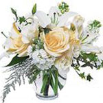 This Gorgeous Arrangement of White Roses and Lilies is Surely The Right Choice....