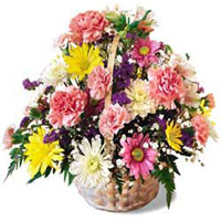 This cheery basket of bright and fluffy pink, purple, yellow, white and red is a...