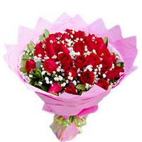 48 red roses, with babybreath and greens, pink pac......  to Dongying