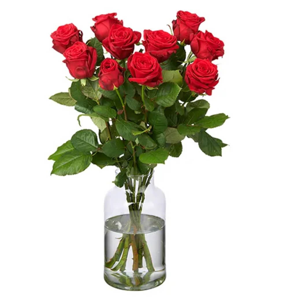 A delightful arrangement of superb and unique red roses? Our superior long-stemm...