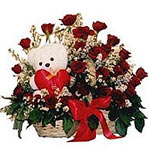 Fine basket with gorgeous fresh red roses plus a t...