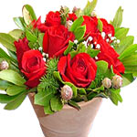 A contemporary presentation of red roses with mix ...