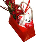 Surprise someone special with red flowers and tedd...
