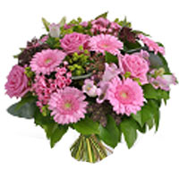 Appealing stylish bouquet pink and white flowers completed with beautiful decora...