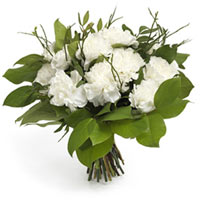 A clean, white bouquet classic! A packed bouquet of pure and white carnations ni...
