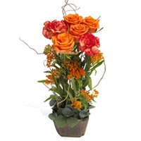 A remarkable and modern sculpture of orange roses that suit as a wonderful cente...