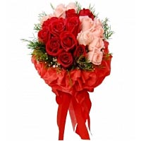 Precious bouquet made of red roses and pink aster combined with a packaging. Des...