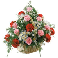 Explosion of color and scent in a special basket filled with a floral arrangemen...