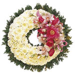 A striking memorial wreath including delicate chry......  to flowers_delivery_east torrens_australia.asp