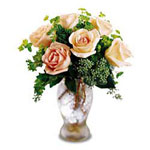 It's a poem of blooms in this glass vase arrangeme......  to moncton_florists.asp