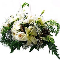 The holiday centerpiece was designed in the spirit......  to flowers_delivery_leduc_canada.asp