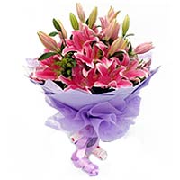 7 pink lilies, with greens, light purple package  ......  to Luoyang