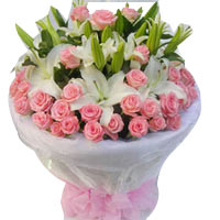 36 pink roses, 6 white lilies, white gauze,roung b......  to baotou_florists.asp