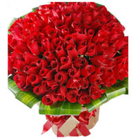 99 premium red roses, with green, and brown paper ......  to jintan_florists.asp