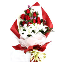 9 red roses, 2 lilies, match leaves, and forget-me......  to flowers_delivery_mianyang_china.asp