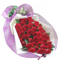 36 red roses, match greenery, white paper wrap ins......  to flowers_delivery_dantu_china.asp