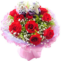 10 red roses with babybreath and greens, two littl......  to Duyun_china.asp