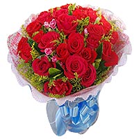 33 red roses with greens, pink round package, blue......  to yanan_florists.asp