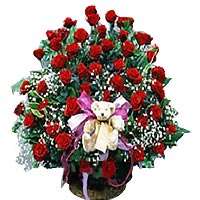 66 red roses, baby's breath, a litter bear, corbei......  to baotou_florists.asp