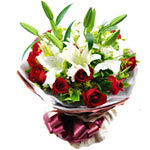 11 red roses, 2 white lilies, with greens, red pac......  to lincang_florists.asp