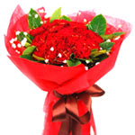  19 red carnations, with greens and babybreath and......  to putian_florists.asp