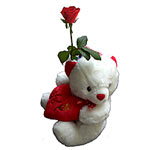 A lovely teddy that offers a red rose printed with......  to lassithiou_florists.asp
