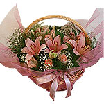 A Luxurious display of scentd lilies, pink roses a......  to larisas_florists.asp