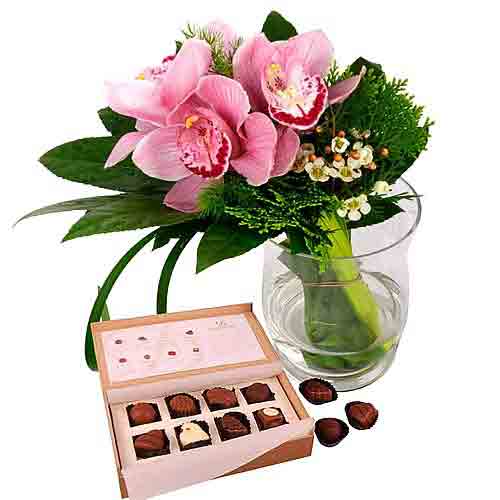 Indulge a friend with a box of chocolates and a po......  to bukit indah_florists.asp