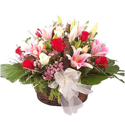 Beauties in a basket. Roses, Stargazers and Barbad......  to sungai siput_florists.asp