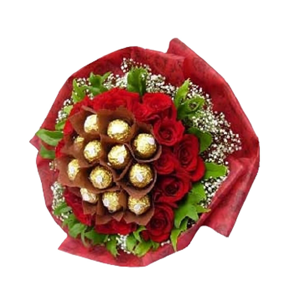 Stunning floral arrangements and a box of Ferrero ......  to kuantan
