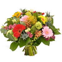 A motley collection of brightly colored flowers make up this sparkling whole. A ...