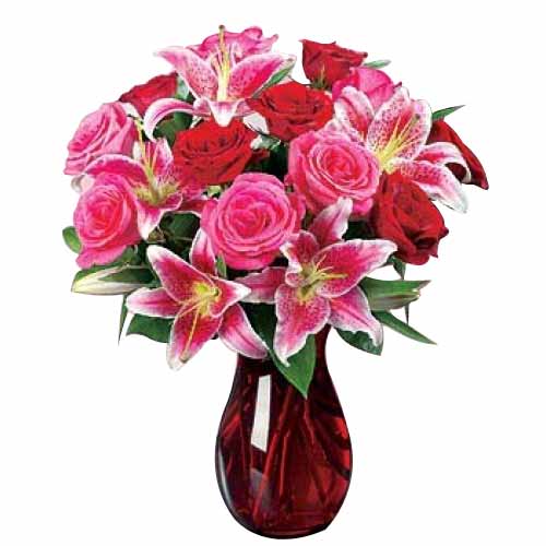 6 pcs red, 6 pcs pink and 6 pcs star gazer in a va......  to flowers_delivery_tacloban_philippine.asp